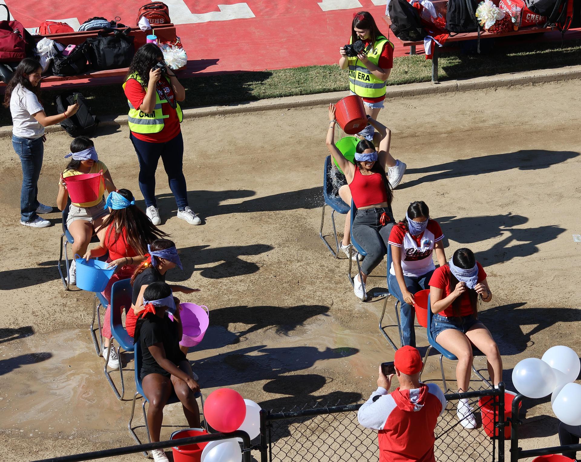 students and staff at the homecoming rally