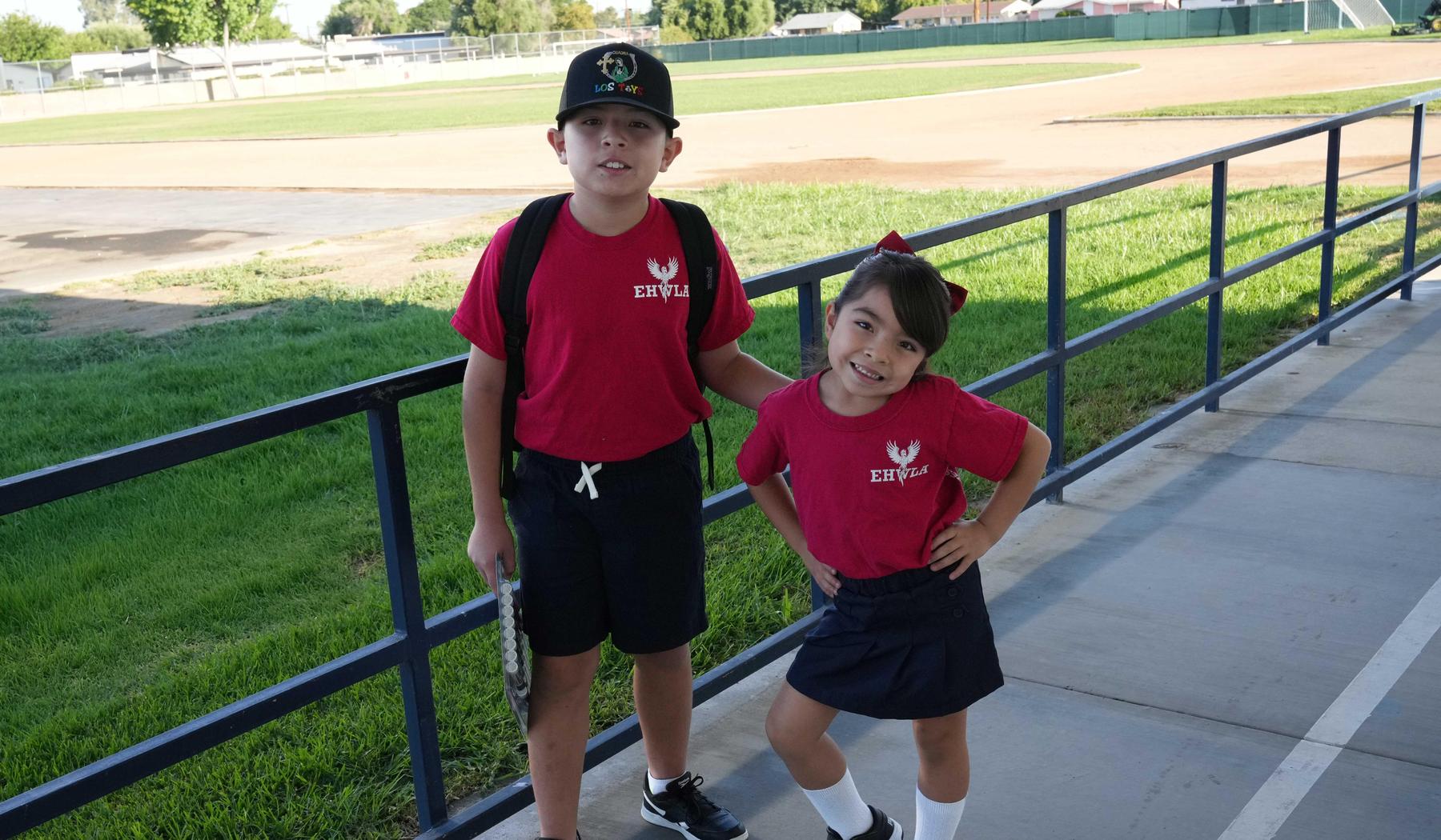 boy and girl standing outside