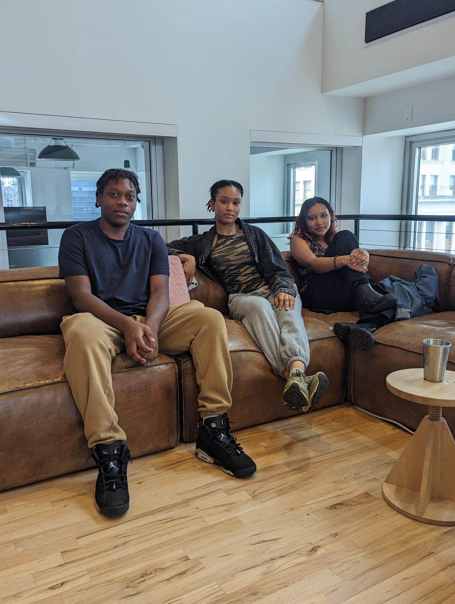 interns on sofa at WeWork