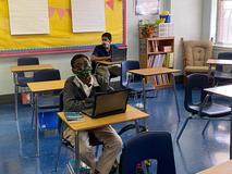 Students using their new Chromebook