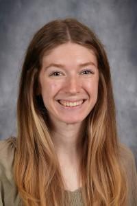 Female teacher with long hair