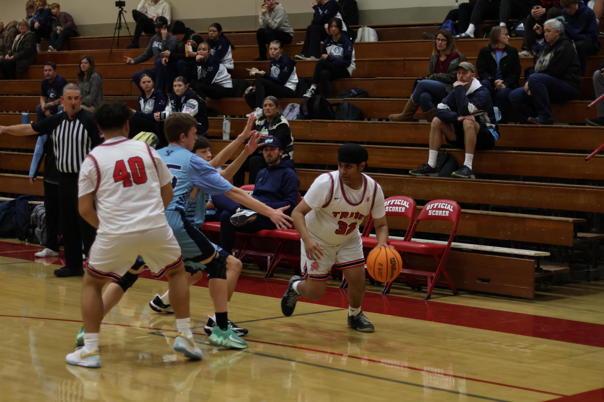 junior varsity boys playing basketball against yosemite