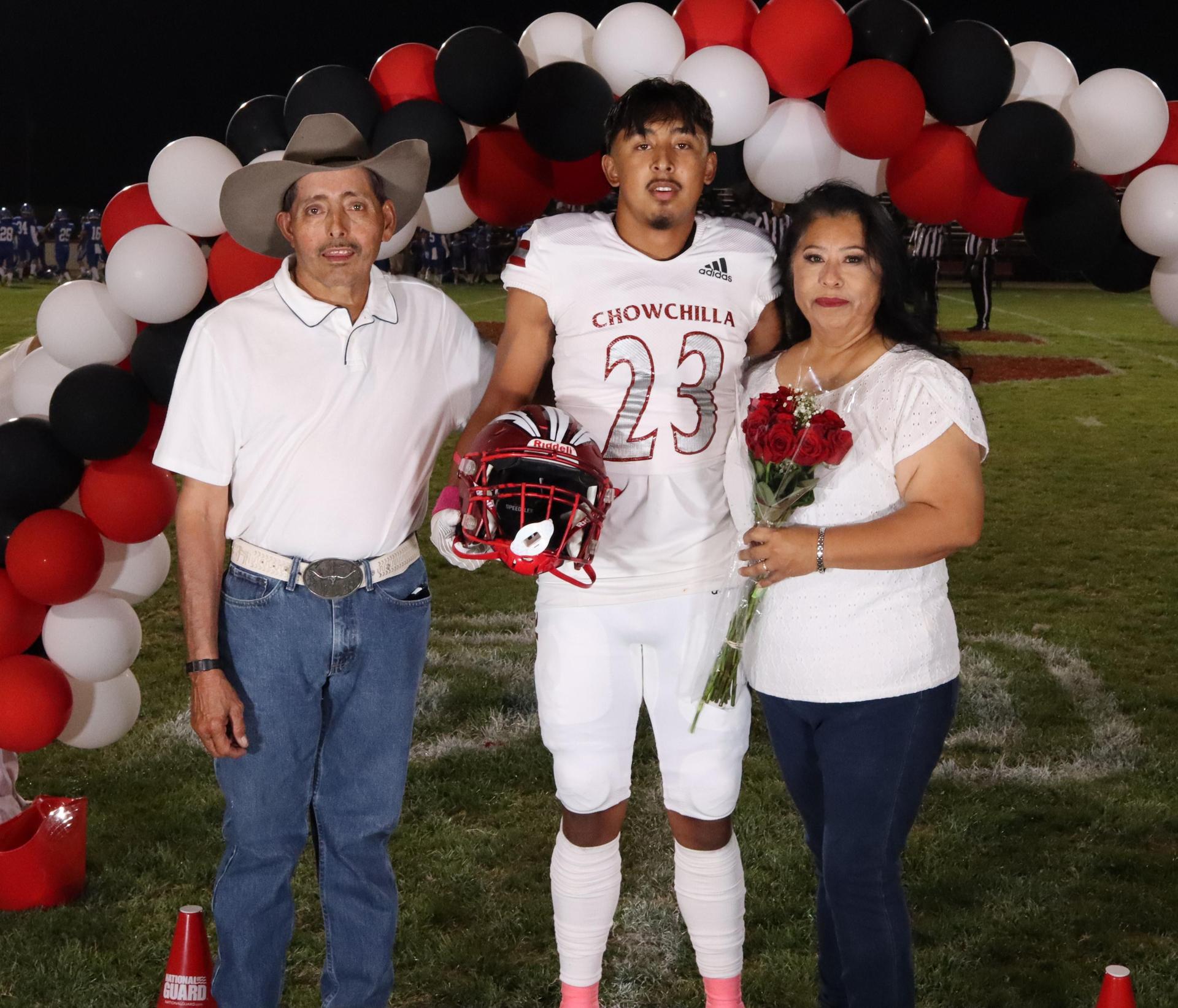 seniors and their escorts celebrating senior night