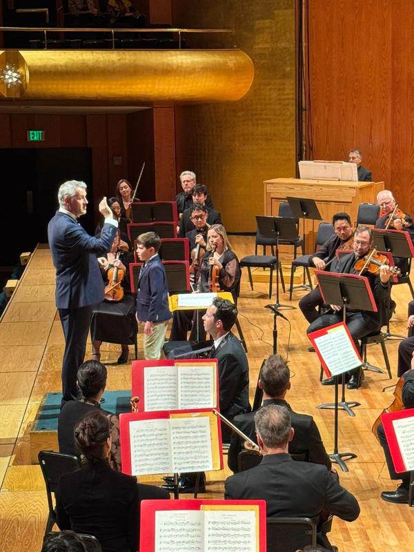 MCS chorister with Utah Symphony Music Director, Markus Poschner. Photo: Melanie Malinka