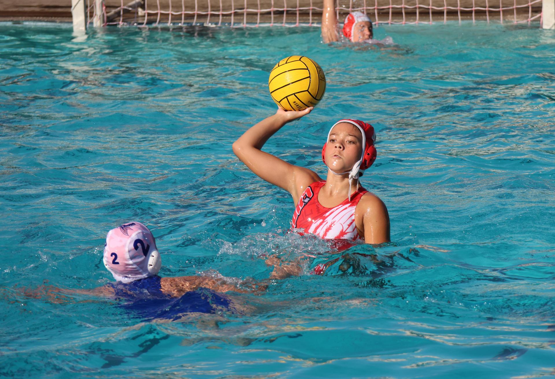 girls playing water polo against Sanger West