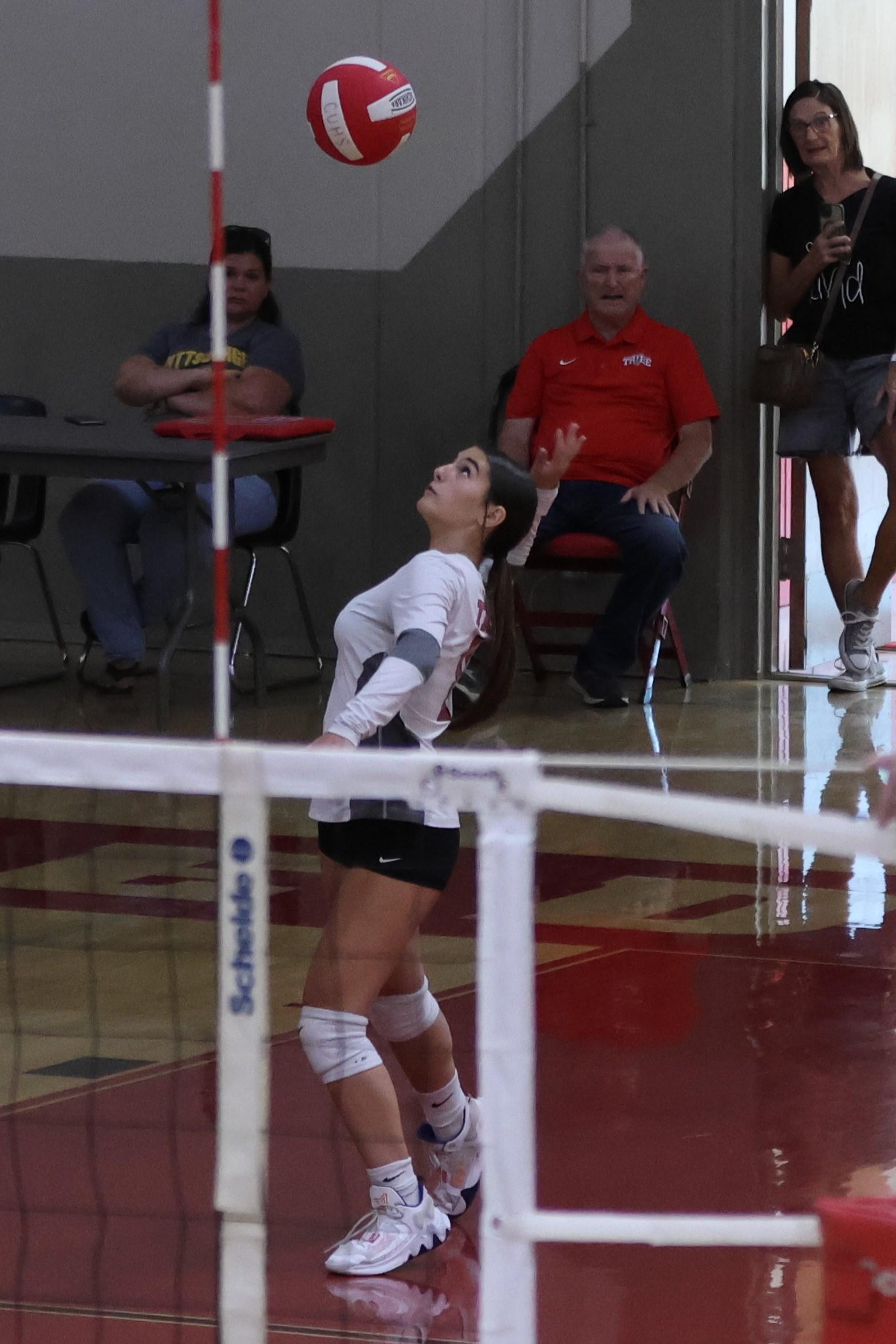 junior varsity girls playing volleyball 73