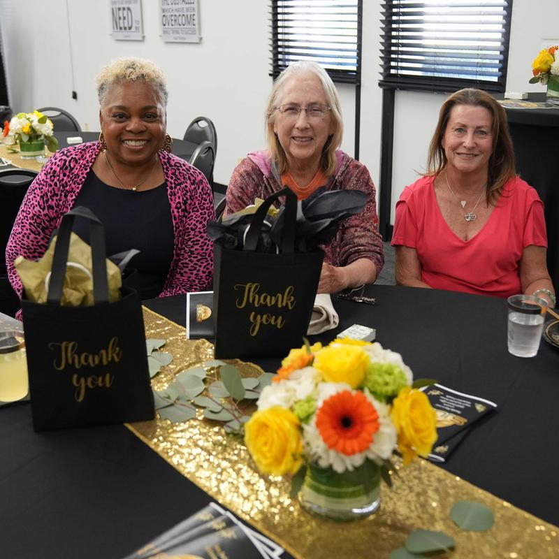 three retirees at the SJUSD Retirement Reception