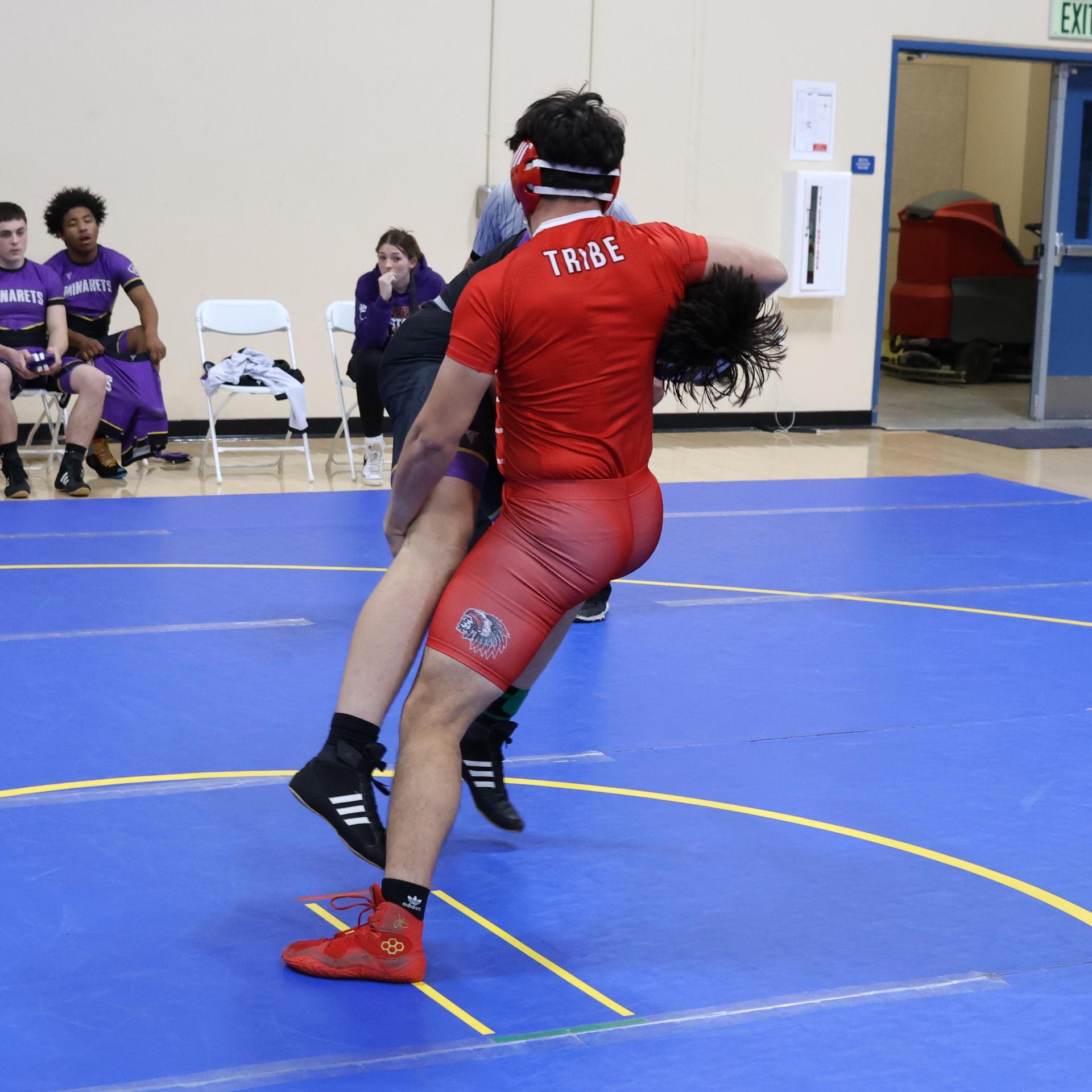 wrestlers in action at parlier