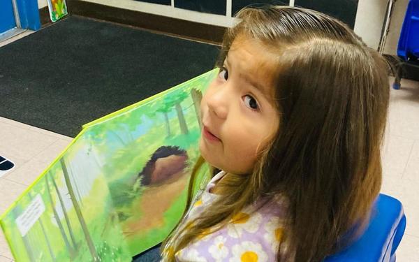 student reading a book