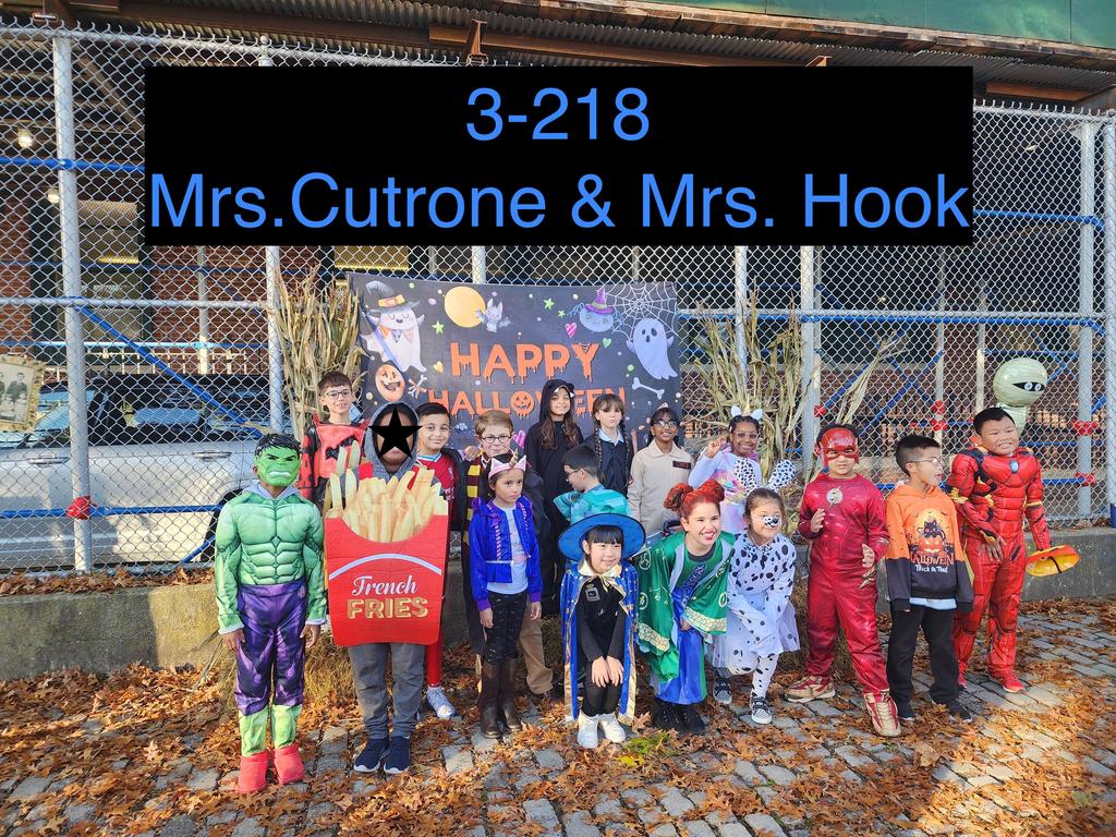 staff and students in halloween costumes