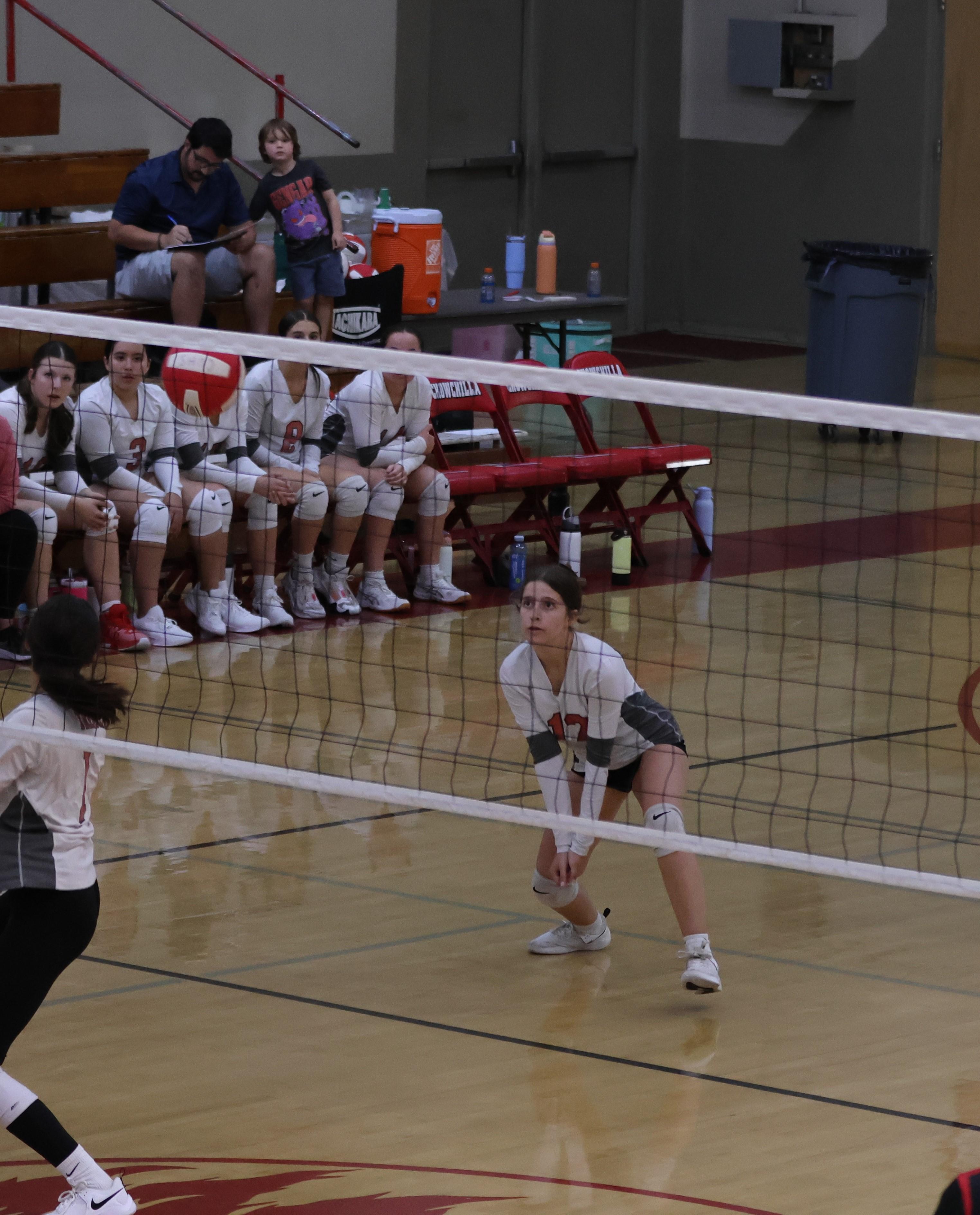 junior varsity girls playing volleyball 101