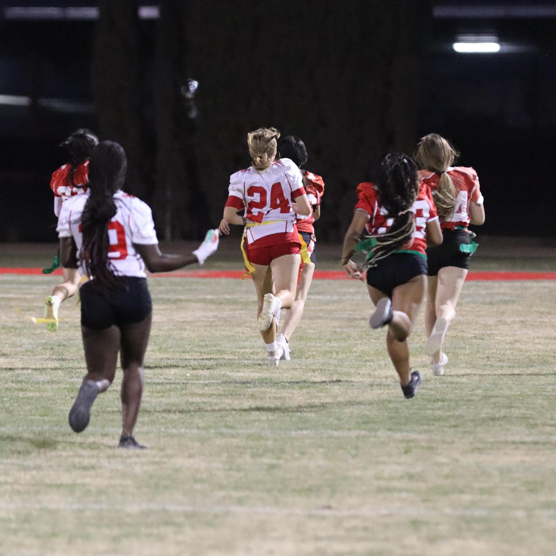 girls playing flag football
