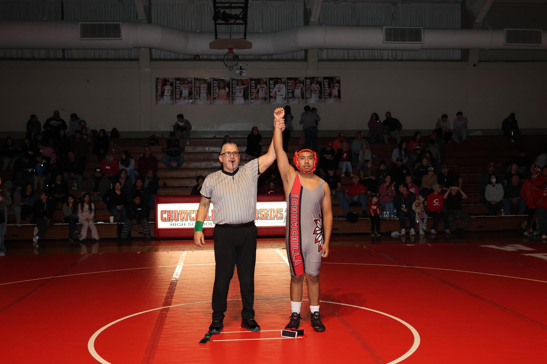 Wrestling winners with hands up 40