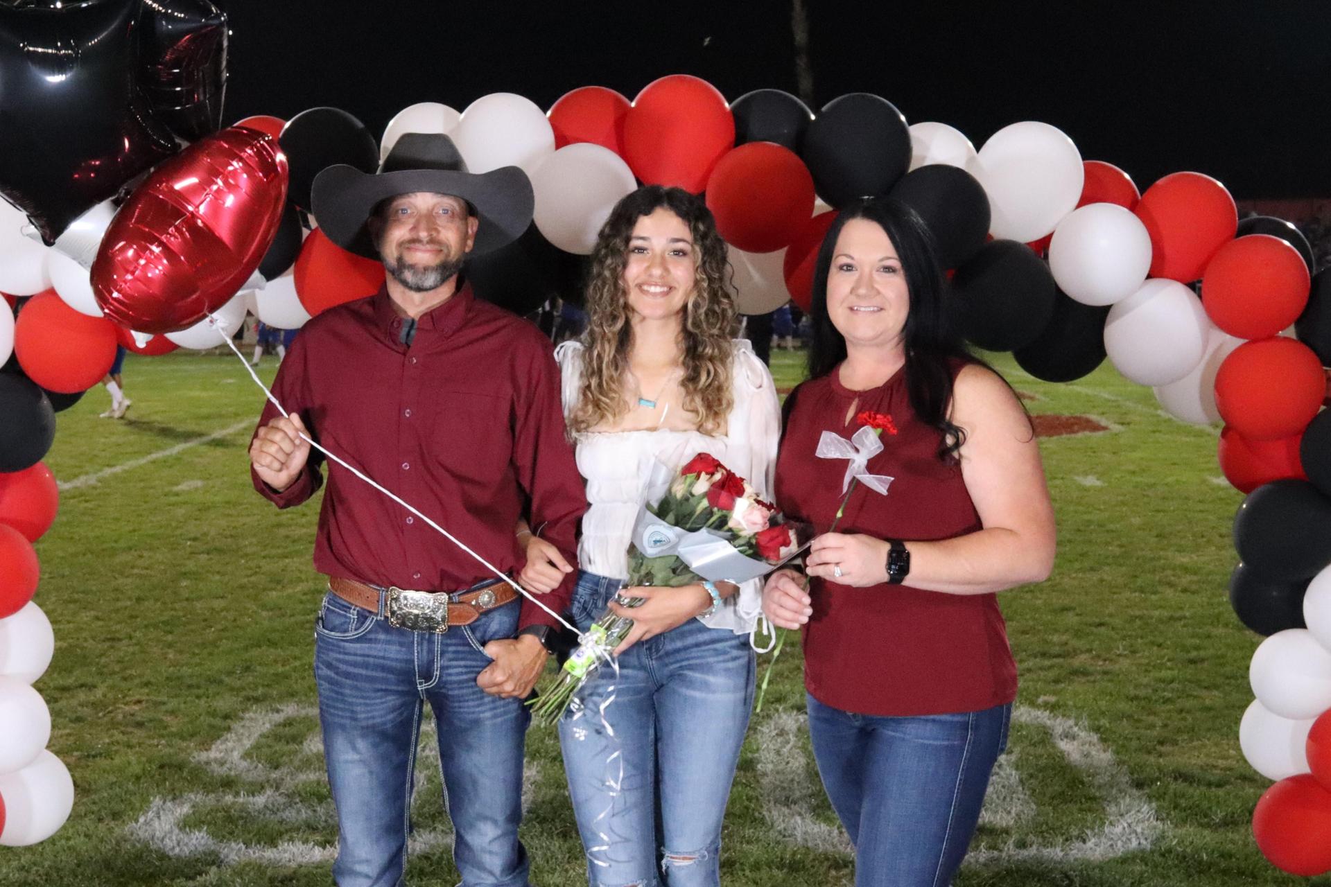 seniors and their escorts celebrating senior night