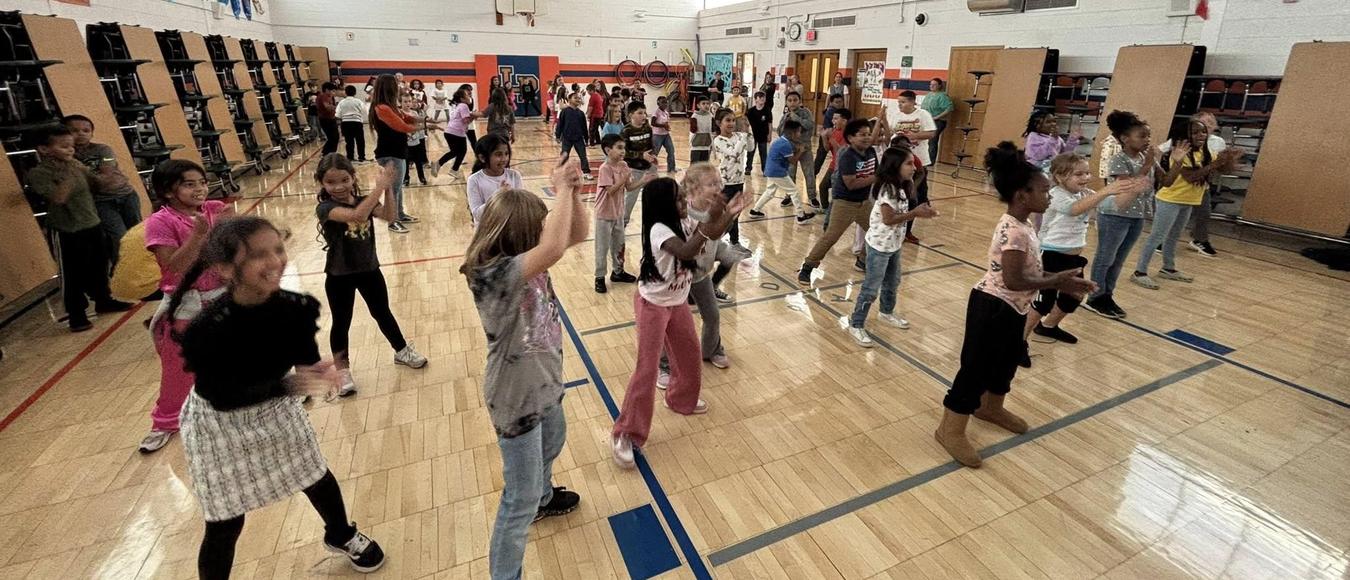 LP students dancing in their gym.