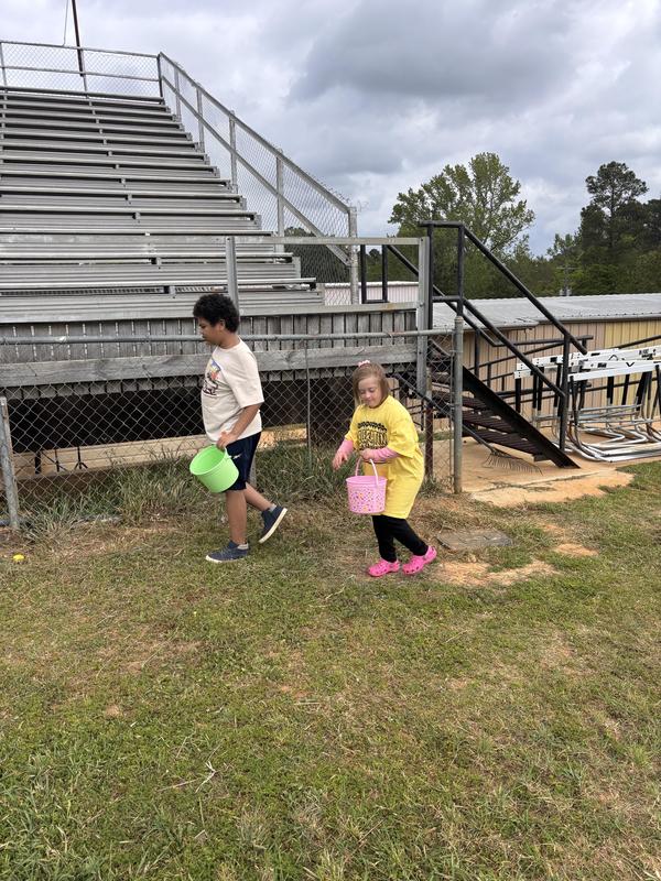 Life Skills kids hunting Easter eggs.