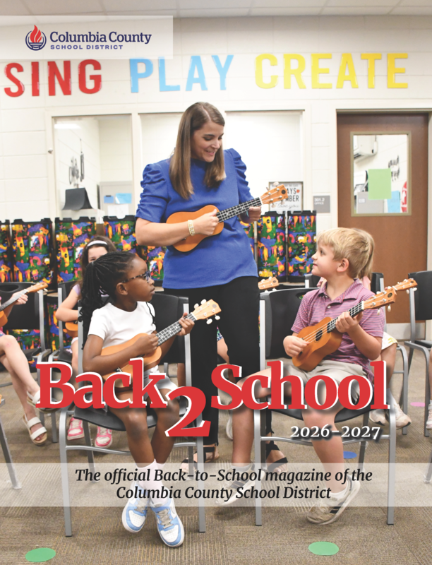 magazine cover photo teacher with students playing ukelele