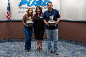people posing in the governing board room
