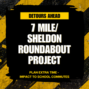 Construction tape with yellow and white text.