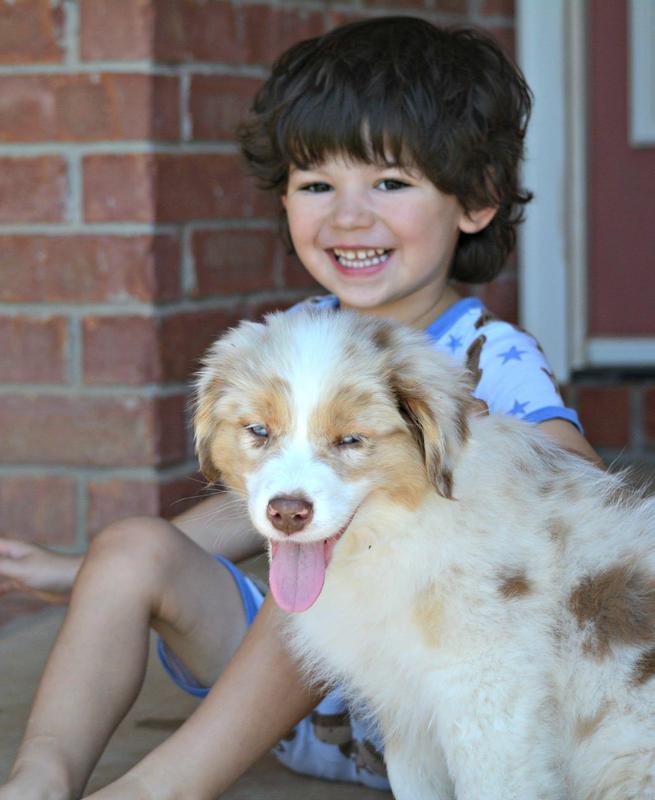 Sawyer Johnson with dog as a child