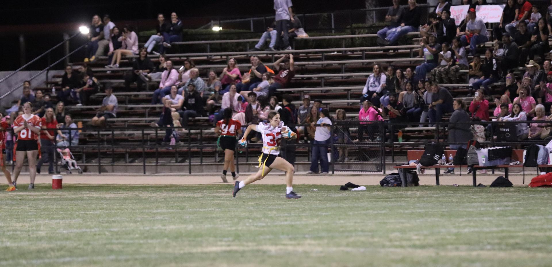 girls playing flag football