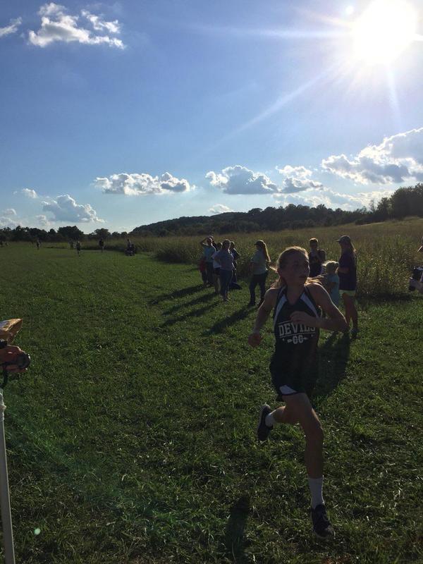 A picture of a girl running.