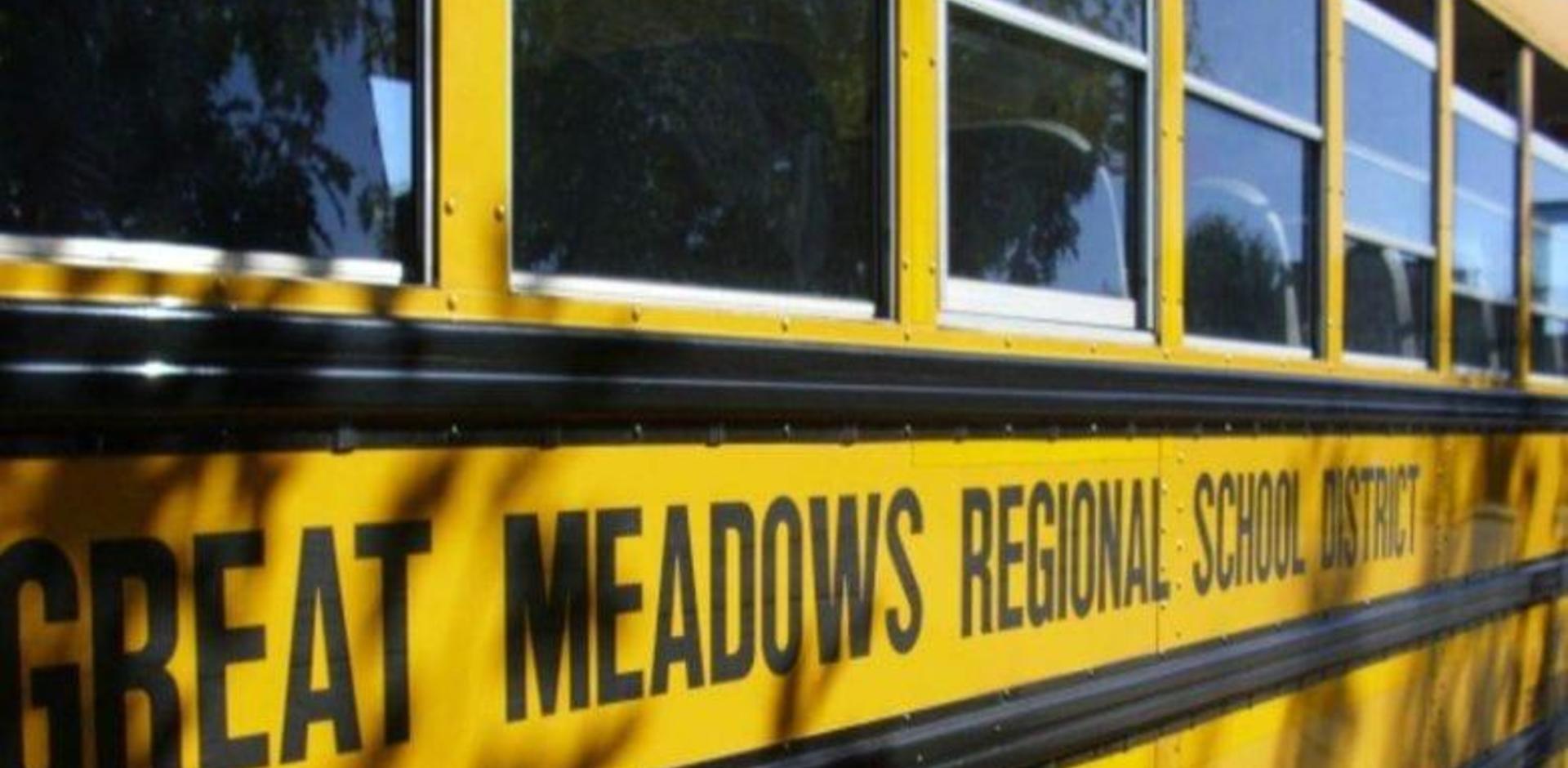 Yellow school bus with the text 'Great Meadows Regional School District' on the side.