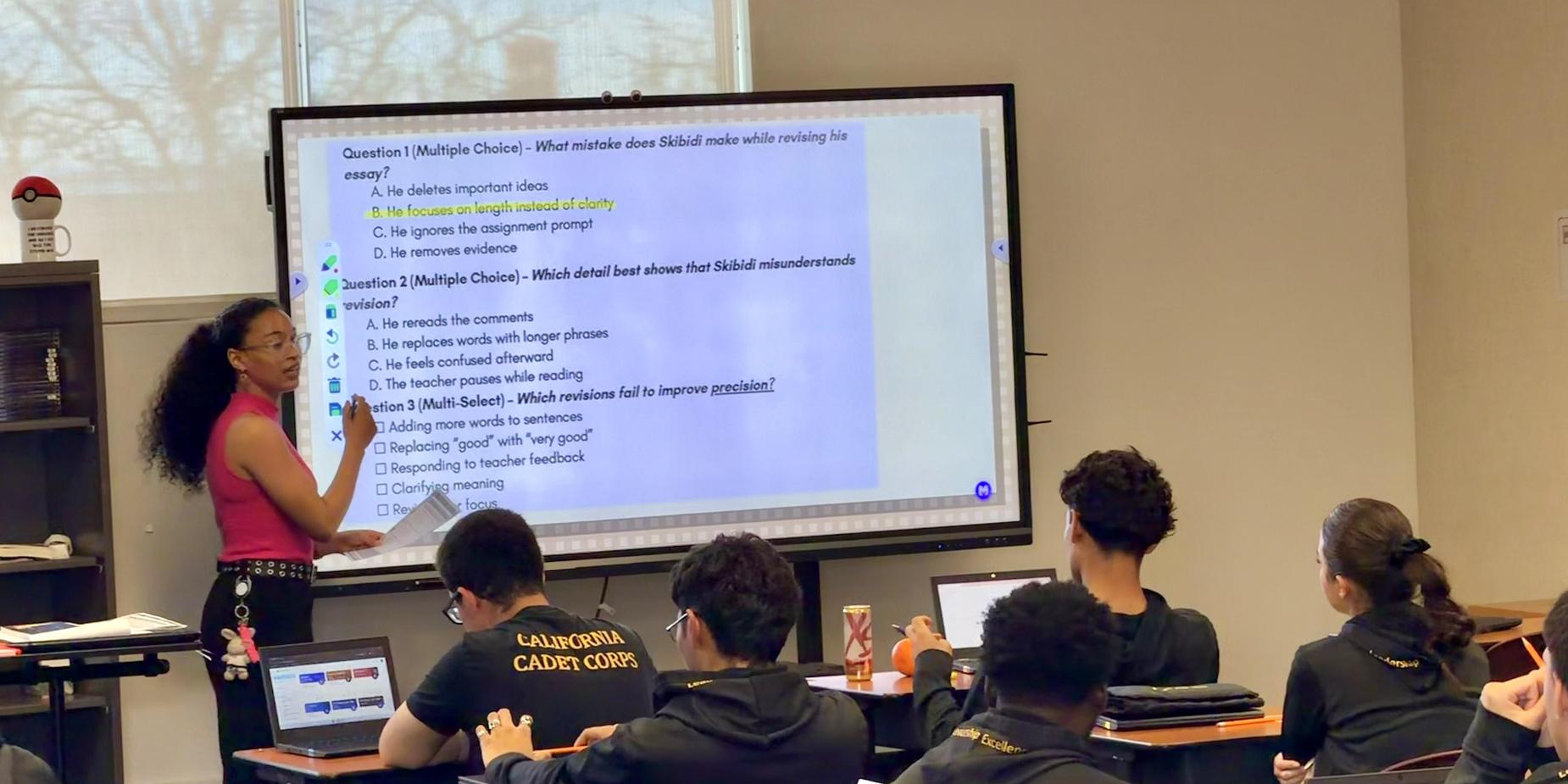 Teacher presenting multiple-choice questions to engaged students in a classroom.