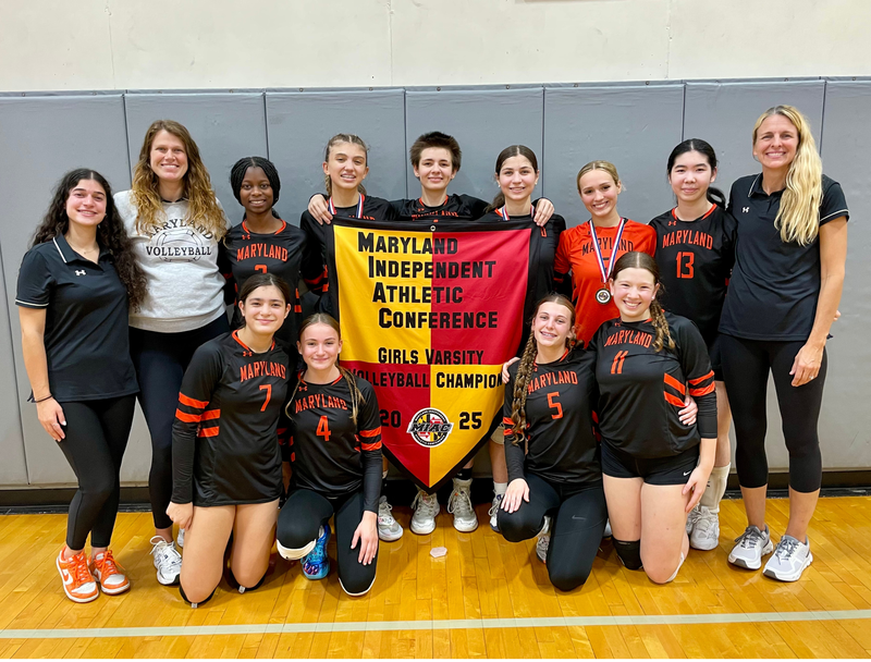 MSD varsity team with MIAC championship banner