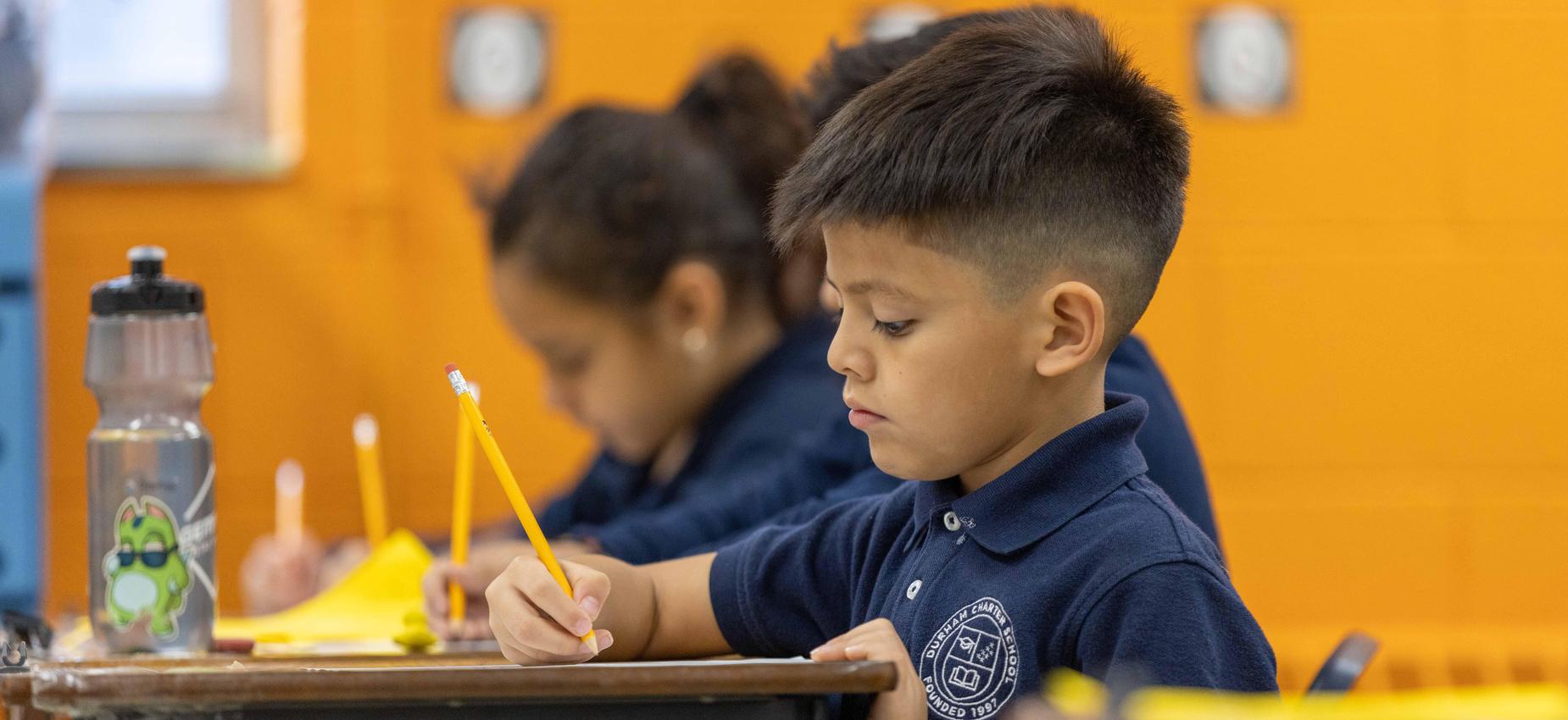 Scholars at work, writing and reading.