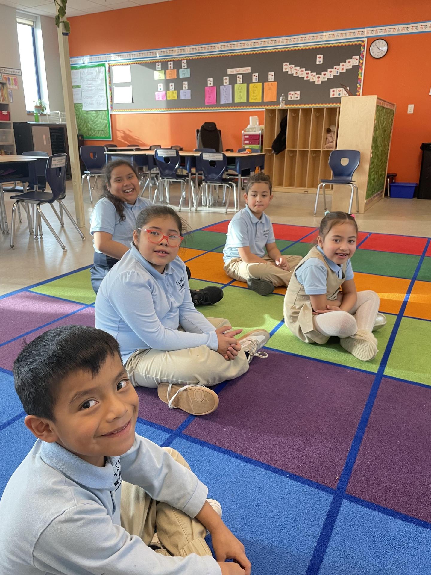 Alma scholars sitting in classroom