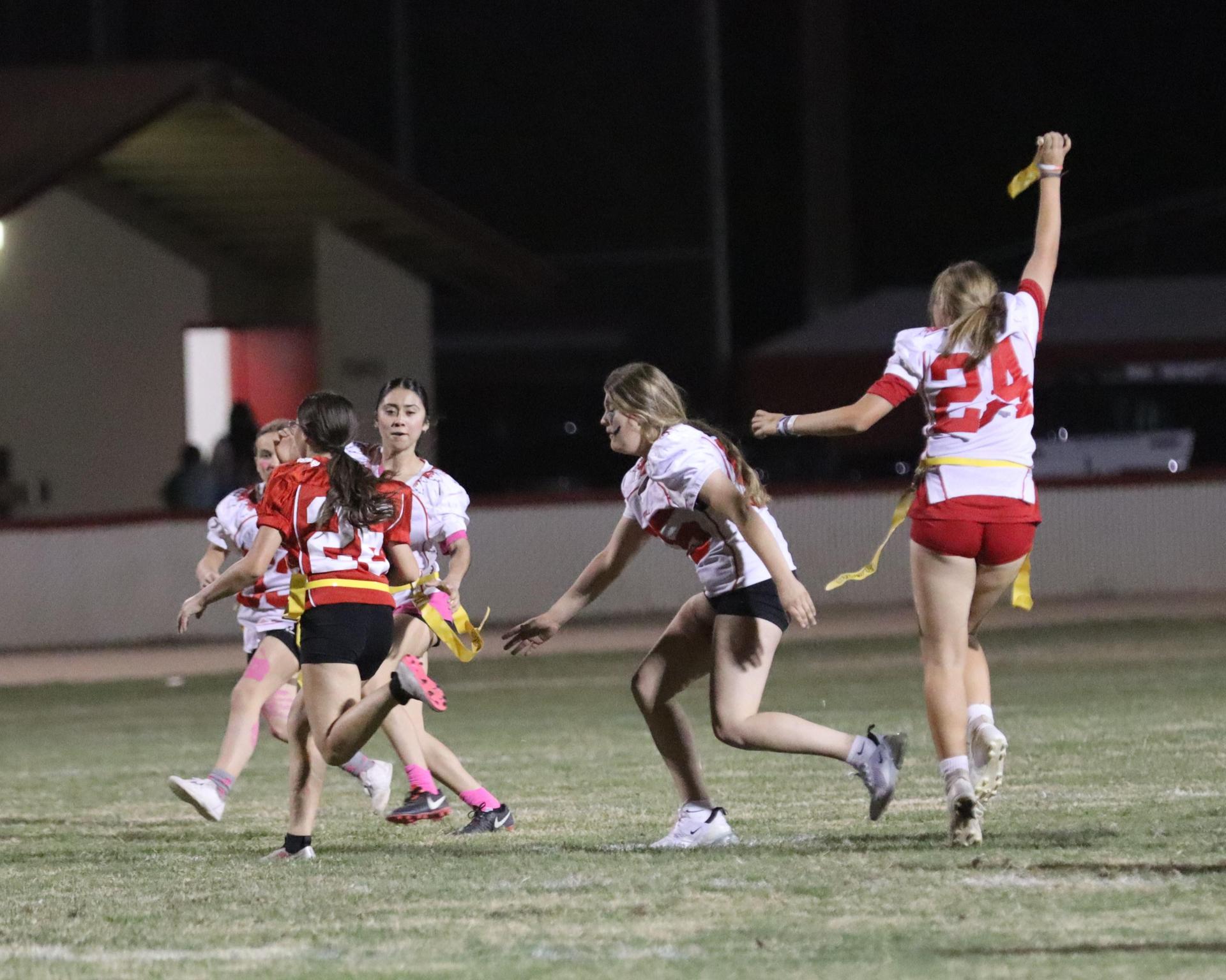 girls playing flag football