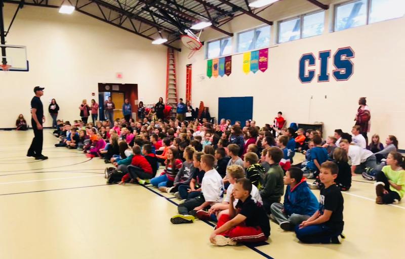 students attend a fire safety assembly