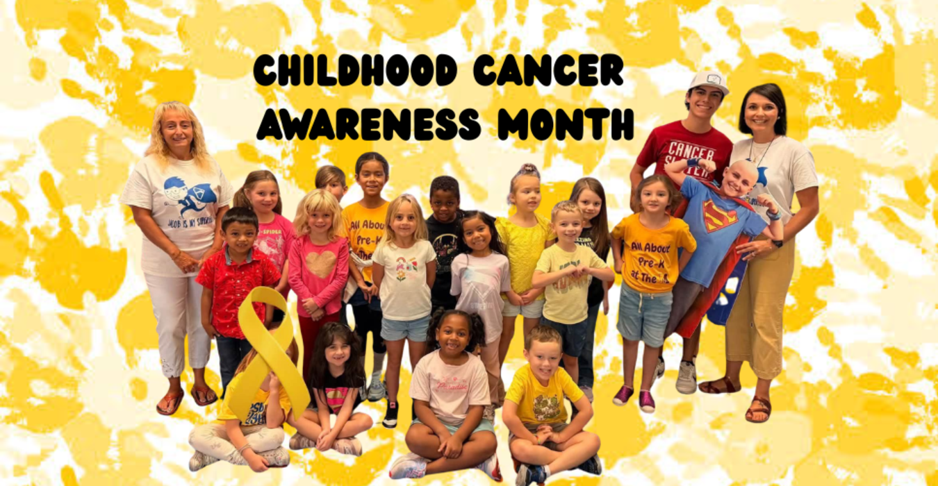 Group of children and adults celebrating Childhood Cancer Awareness Month with yellow ribbon.