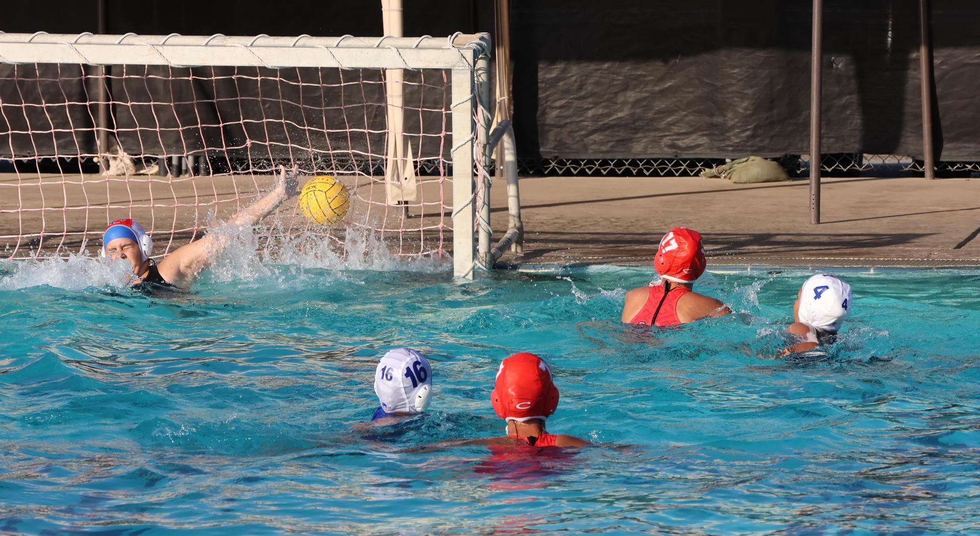 girls playing water polo against Sanger West