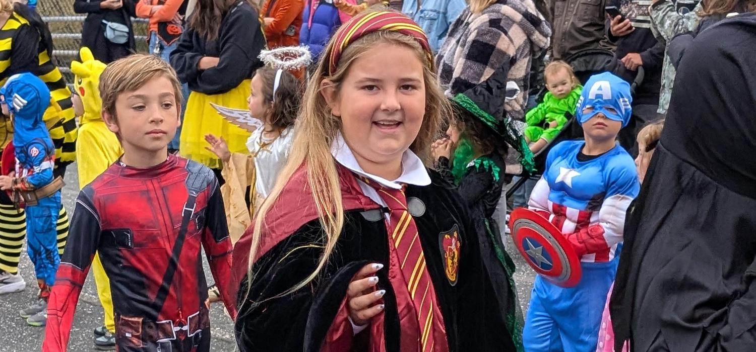 Harry Potter costumed student parades by