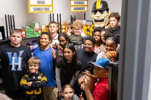 Steely McBeam poses with Dickson students