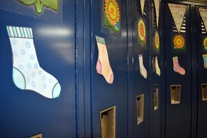 Colorful paper socks stuck to lockers
