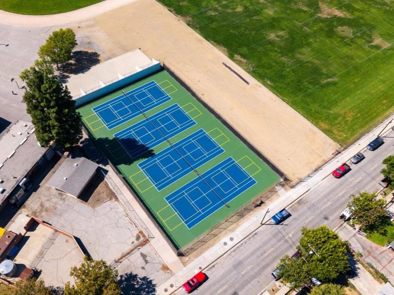 Aerial view of Placerita tennis courts with pickleball overlays.