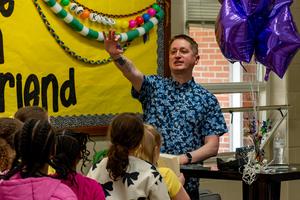 Dozens of passionate readers and potential future authors filled South Elementary School’s library for a special visit from New York Times best-selling author John Schu on Wednesday, February 18, 2026.