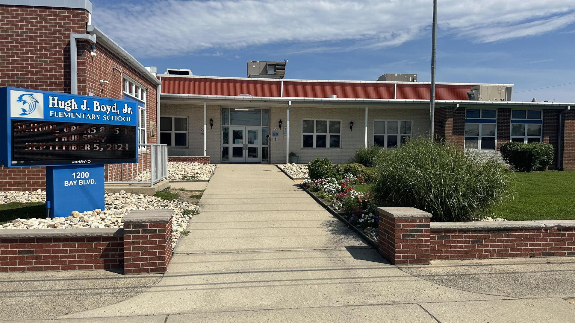 Exterior view of Hugh A. Boyd, Jr. Elementary School with landscaping and signage.