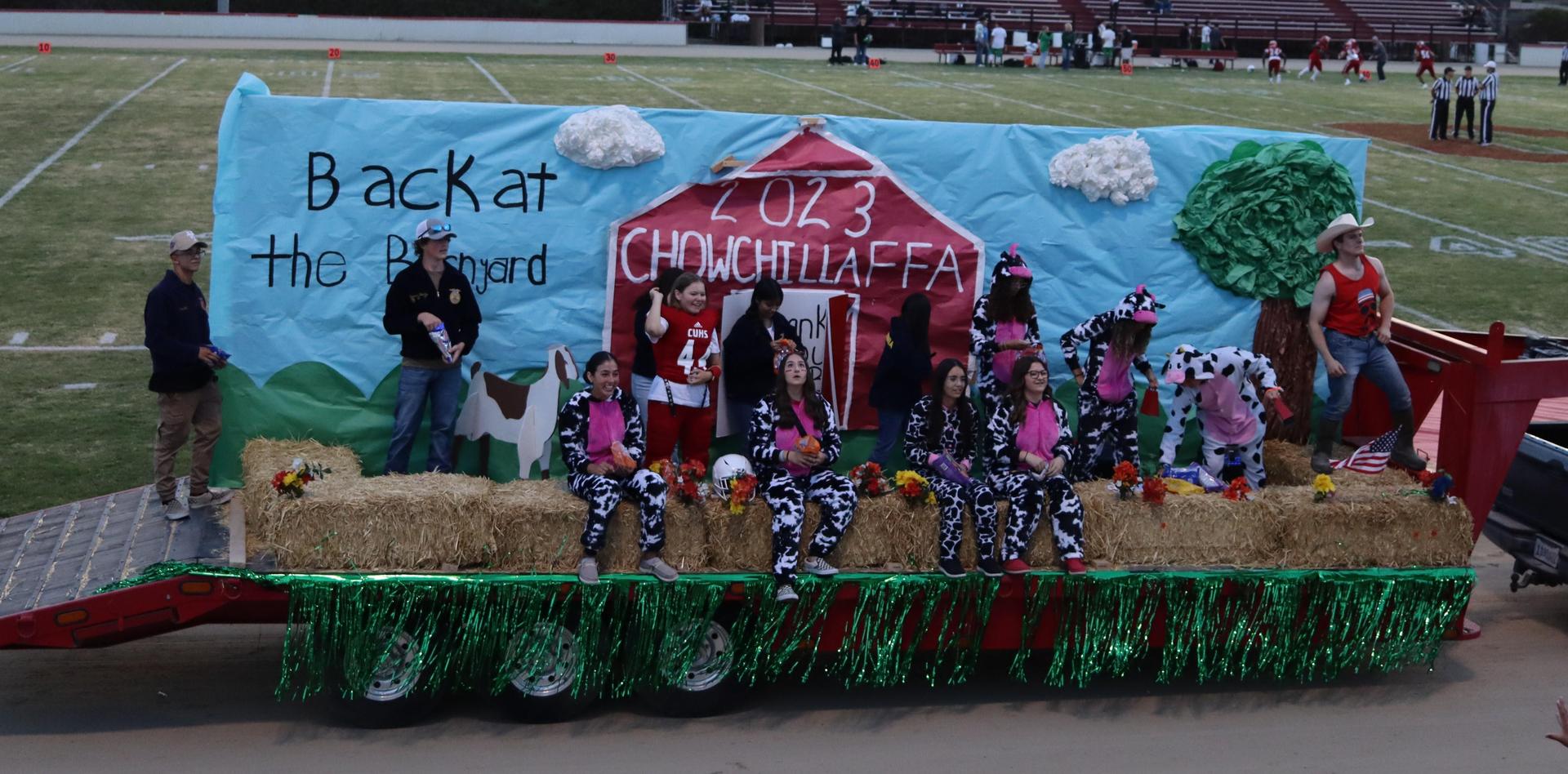 students, staff, and community members enjoying Friday night at the football game