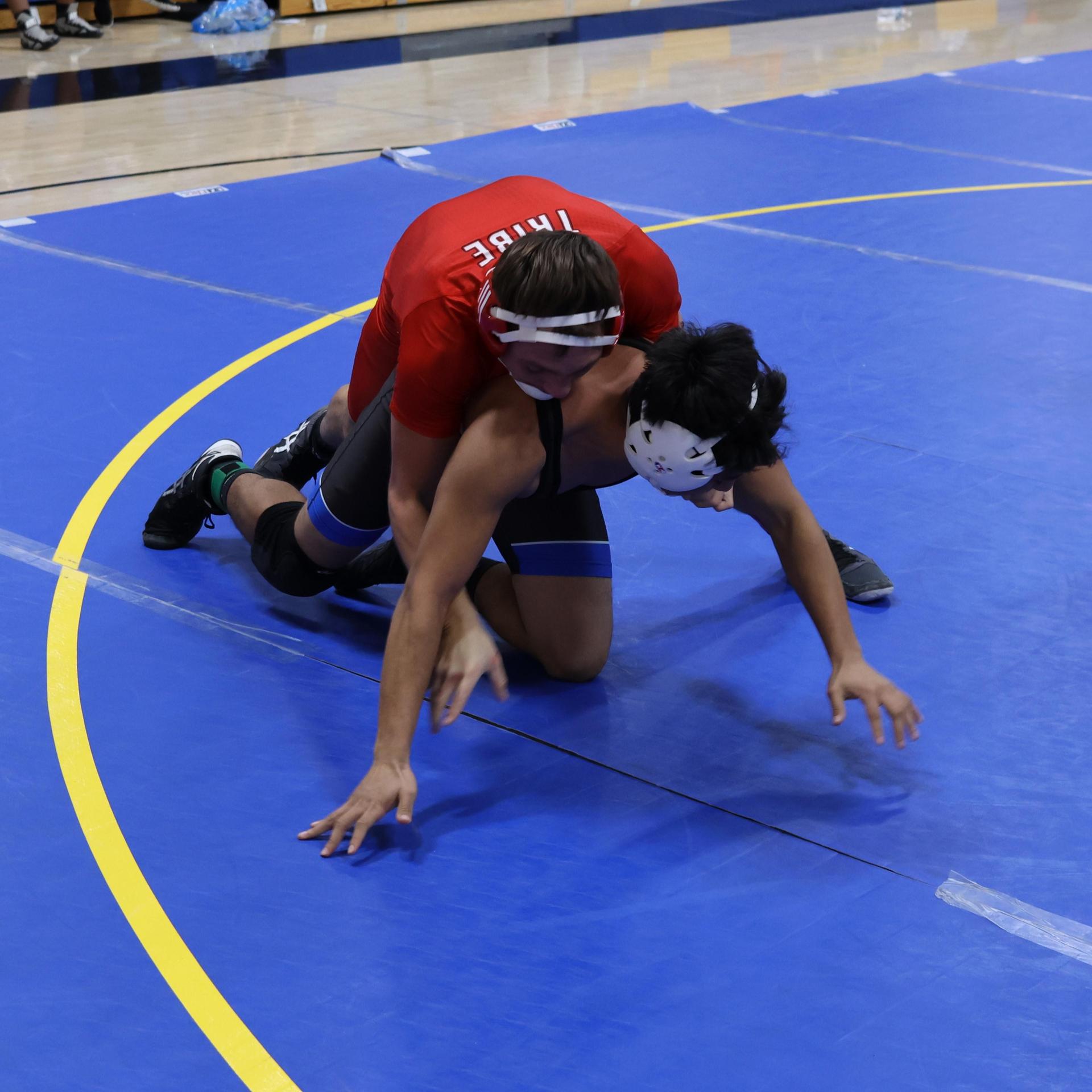 wrestlers in action at parlier