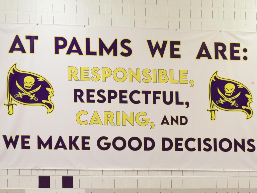 A sign in the school hallway that reads: "At Palisades Middle School We Are: Responsible, Respectful, Caring and Make Good Decisions.