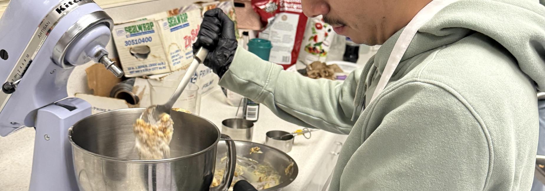 Student making a sweet treat