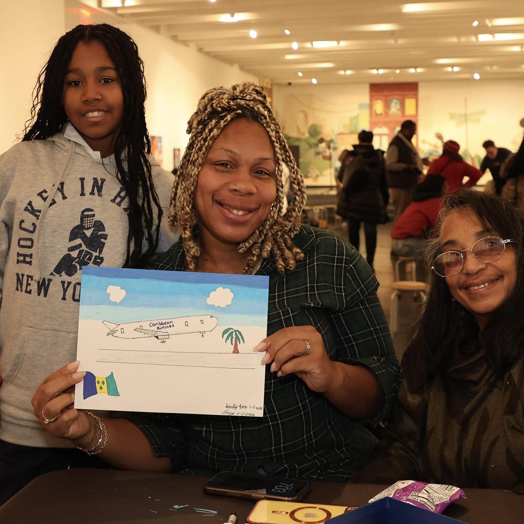 Family showing their art