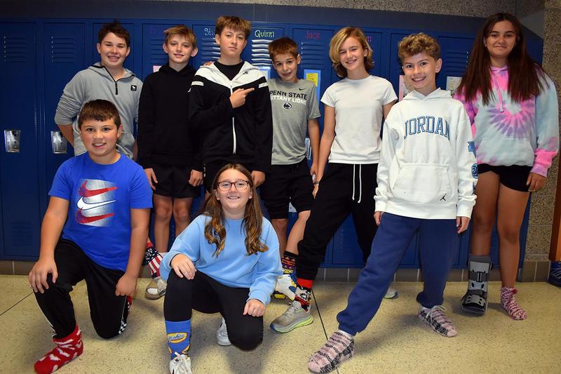 A group of students showing off their socks