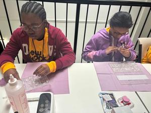 students creating their own custom nails