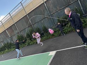 Students playing jump rope