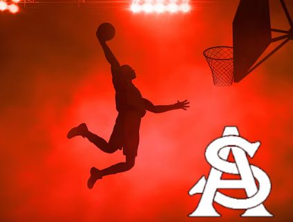 boy dunking on a basketball hoop